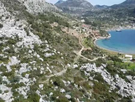 Grundstück Mit Meerblick Zum Verkauf Im Dorf Söğüt Im Bezirk Marmaris, Geeignet Für Investitionen 50 Meter Vom Meer Entfernt